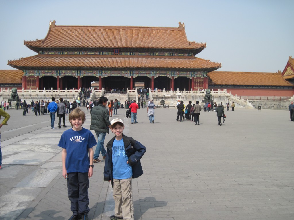 Two of the 80 Diapers kids visit the Forbidden City