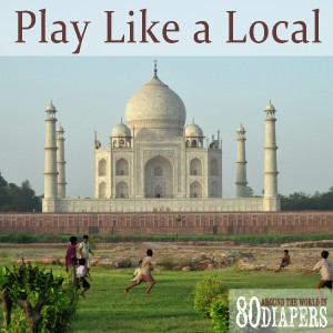 Text reads: "Play like a local" - tips for international travel with children 