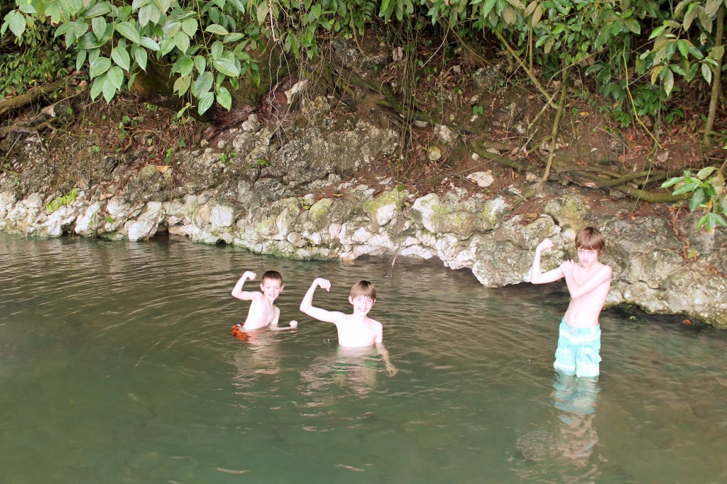 Swimming in the hot springs along the river