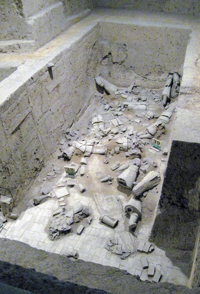 A section of "unrestored" soldiers shows what most of the statues looked like on discovery.