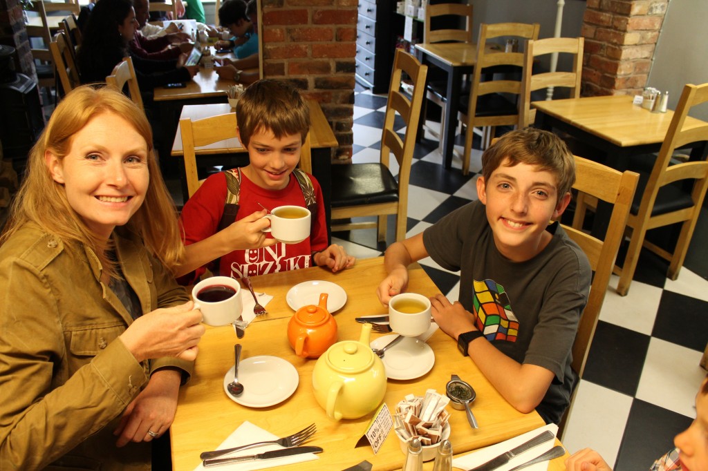 The author and two of her children drink a proper English tea
