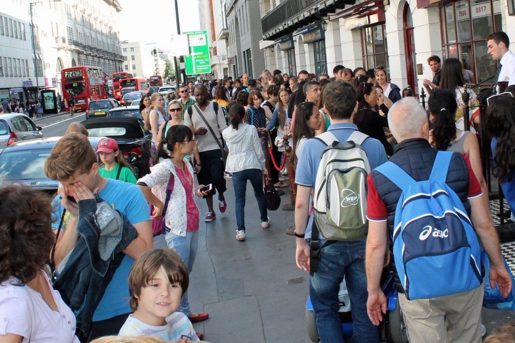 A long line of people stretches down Baker Street as far as you can see