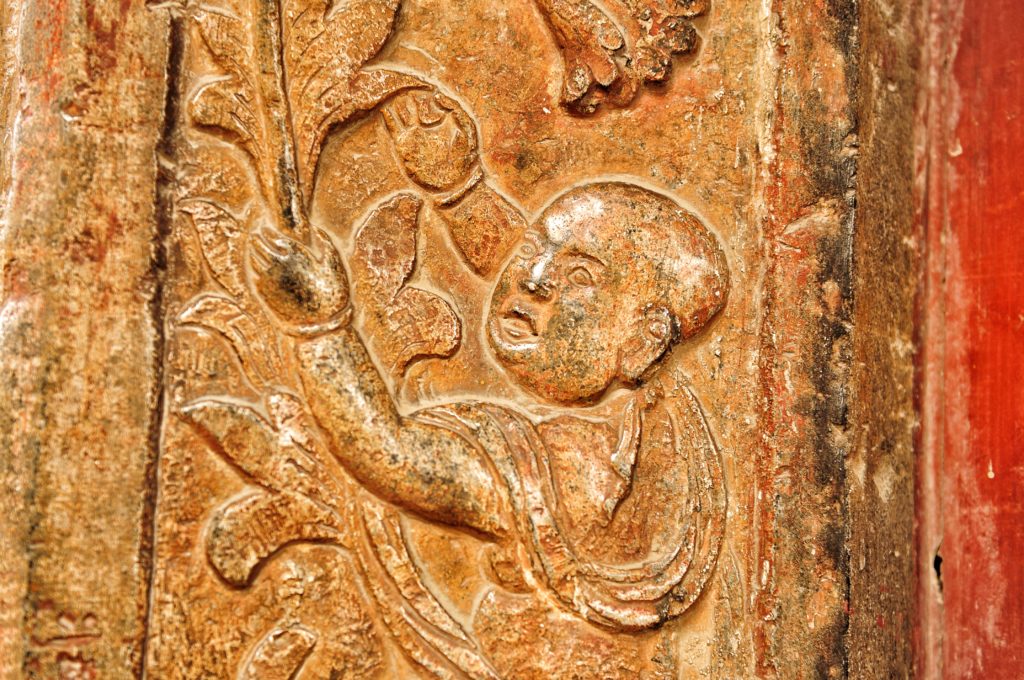 Carvings on a door frame or lintel.